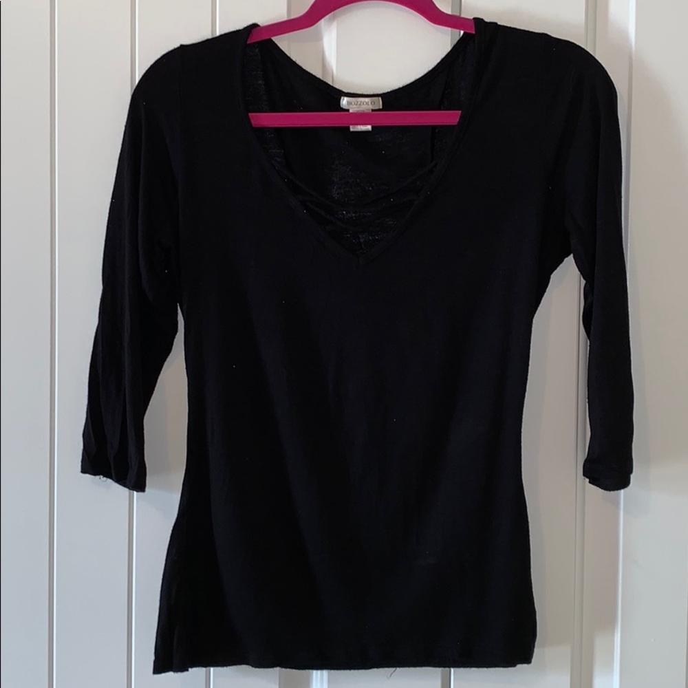 3/4 Sleeve Black Top with crisscrossed neck.